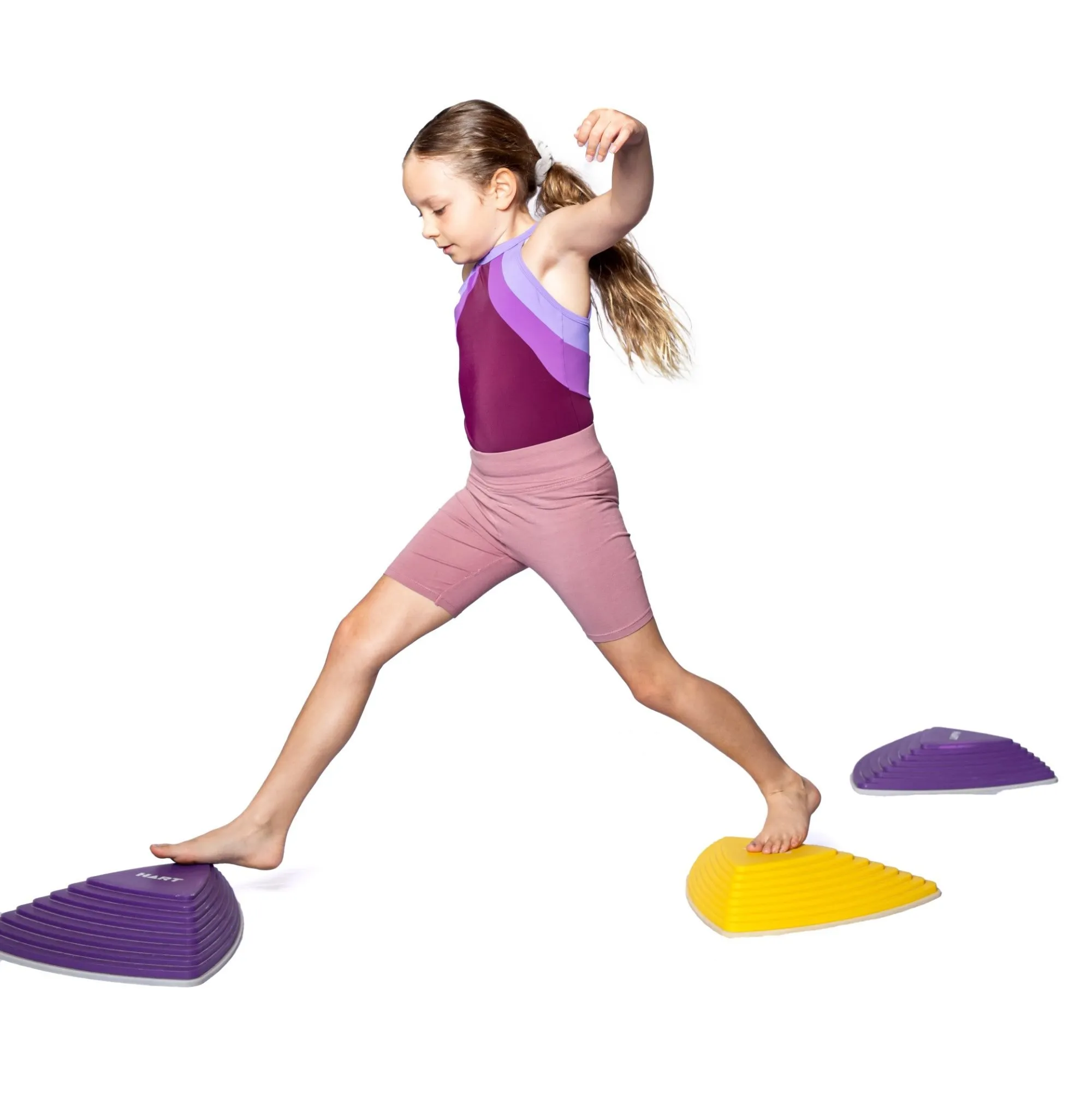 Gymnast crossing stepping stone during the Active Gymnastics holiday program. Related Post: Perth School Holiday Activities